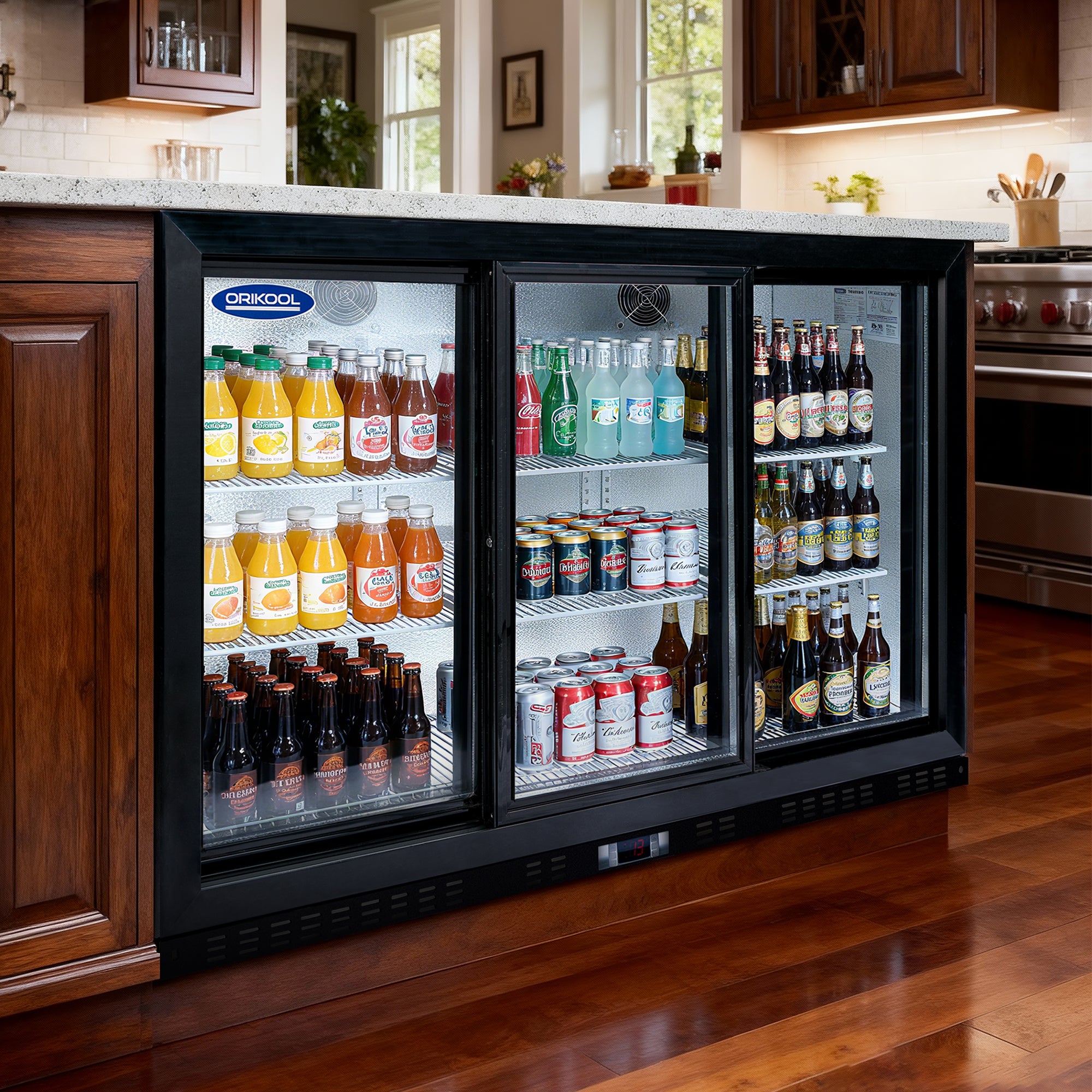 Angled view of a three-door commercial beverage cooler filled with juices, sodas, and beer.