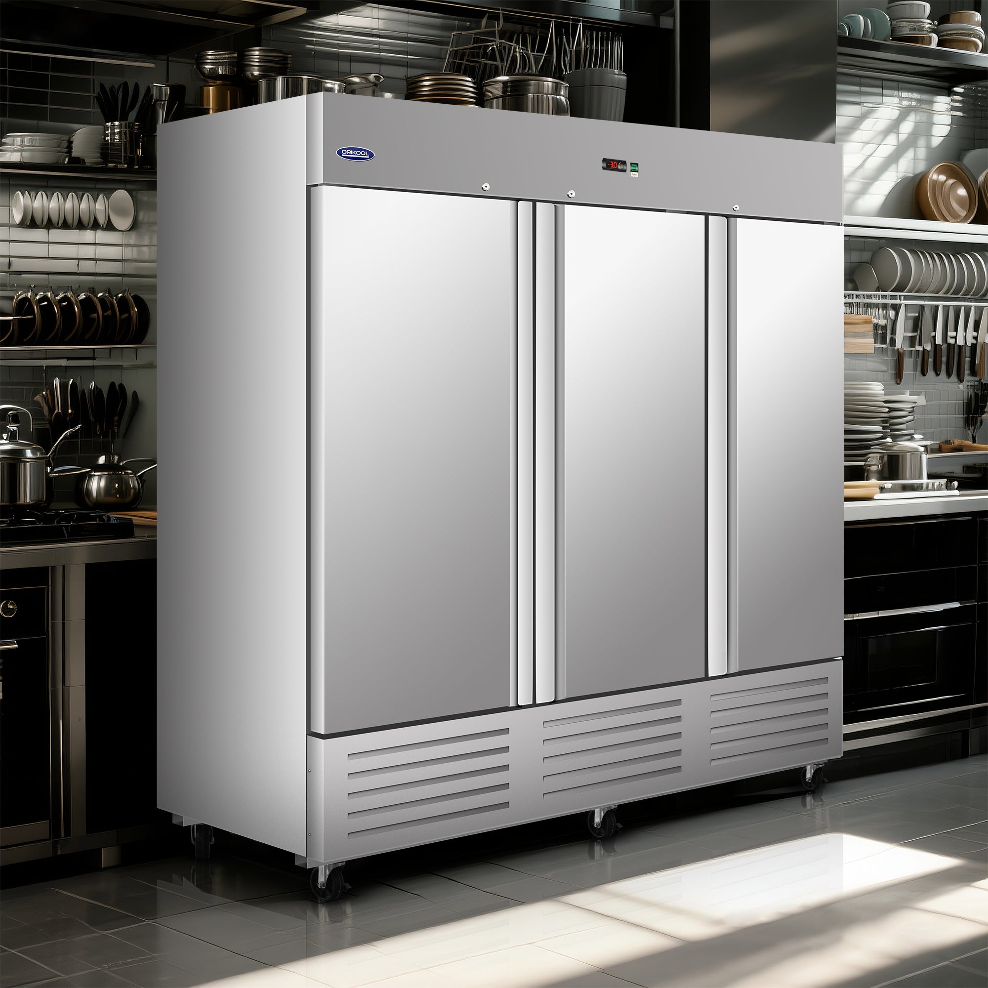 Stainless steel three-door commercial refrigerator positioned in a professional kitchen environment.