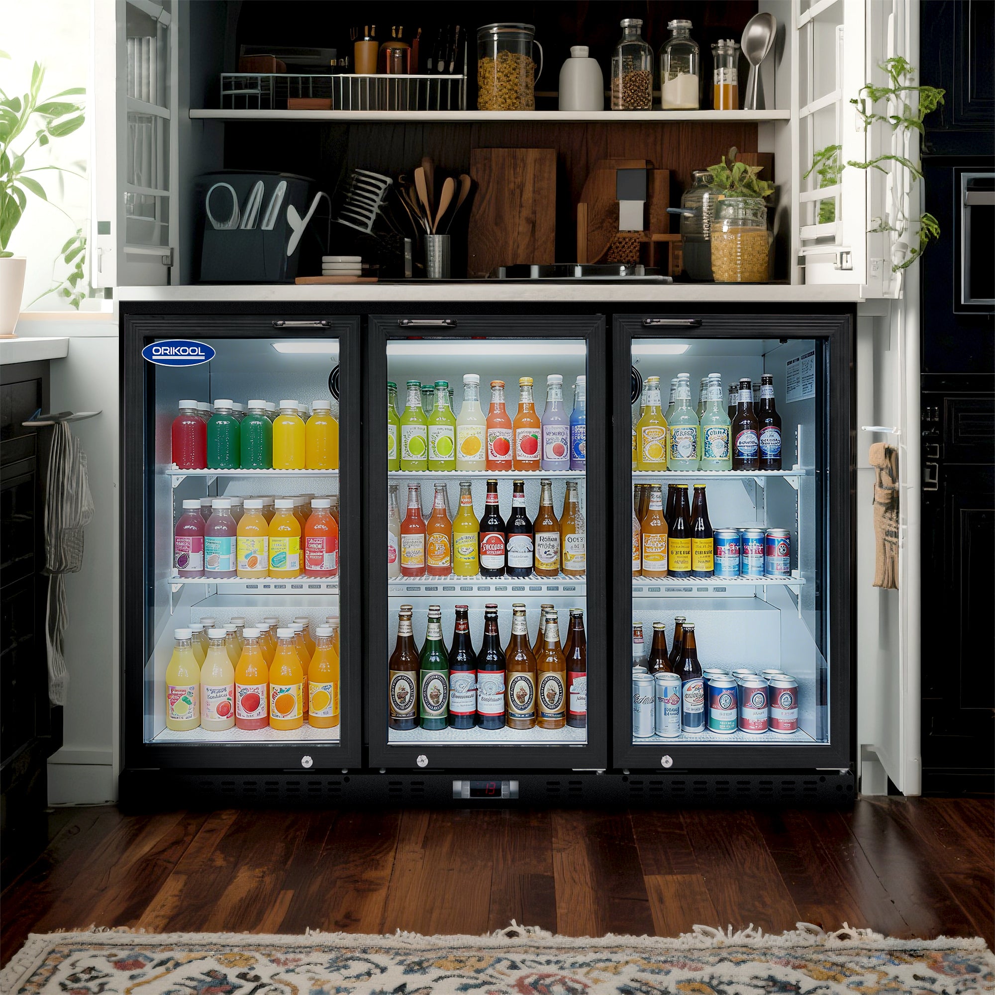Built-in three-door beverage cooler installed in a modern kitchen, stocked with drinks.